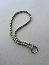 Load image into Gallery viewer, ina seifart - Perlen Long Keyholder - light grey beads, neon orange ribbon
