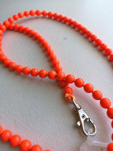 Load image into Gallery viewer, Handykette Phone Necklace - Neon Orange closeup
