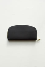 Load image into Gallery viewer, A.P.C Demi-Lune Wallet (Black) - Eugene Choo: this wallet is a true onyx black with gold toned zip around closure