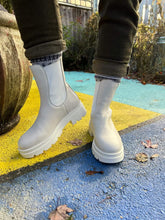 Load image into Gallery viewer, Sister x Soeur Gemma Chelsea Boot in Cream - front with one feet lifted