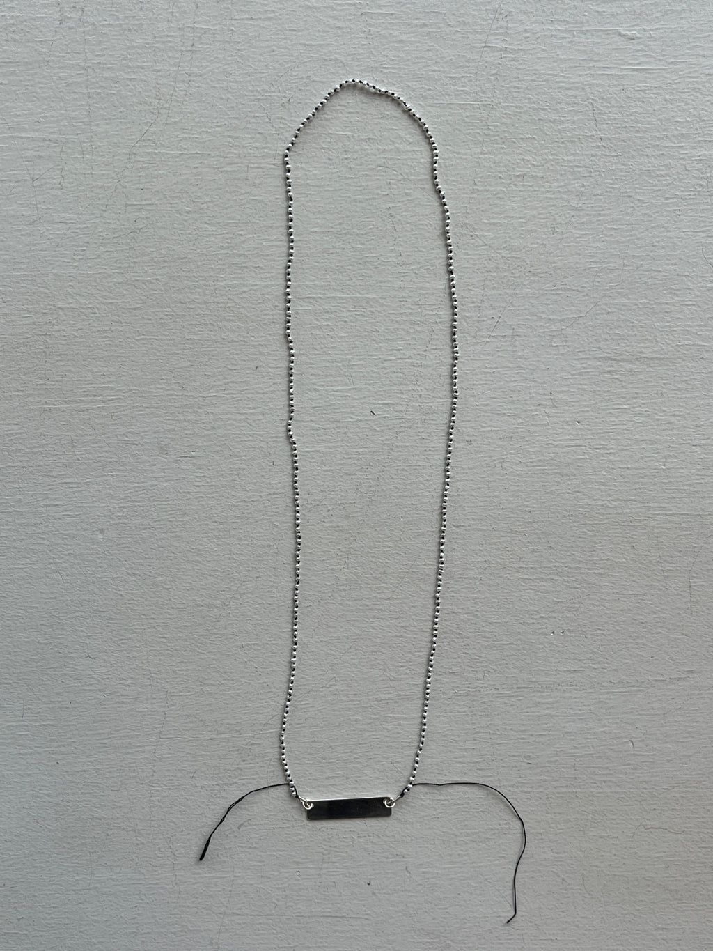 Monica Berdin - Mini pearls necklace on black silk necklace with sterling silver plate