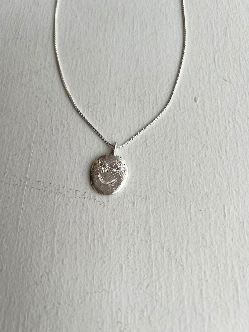 Erica Leal - Bright Eyes Necklace - Smile w/ CZ Eyes - closeup details