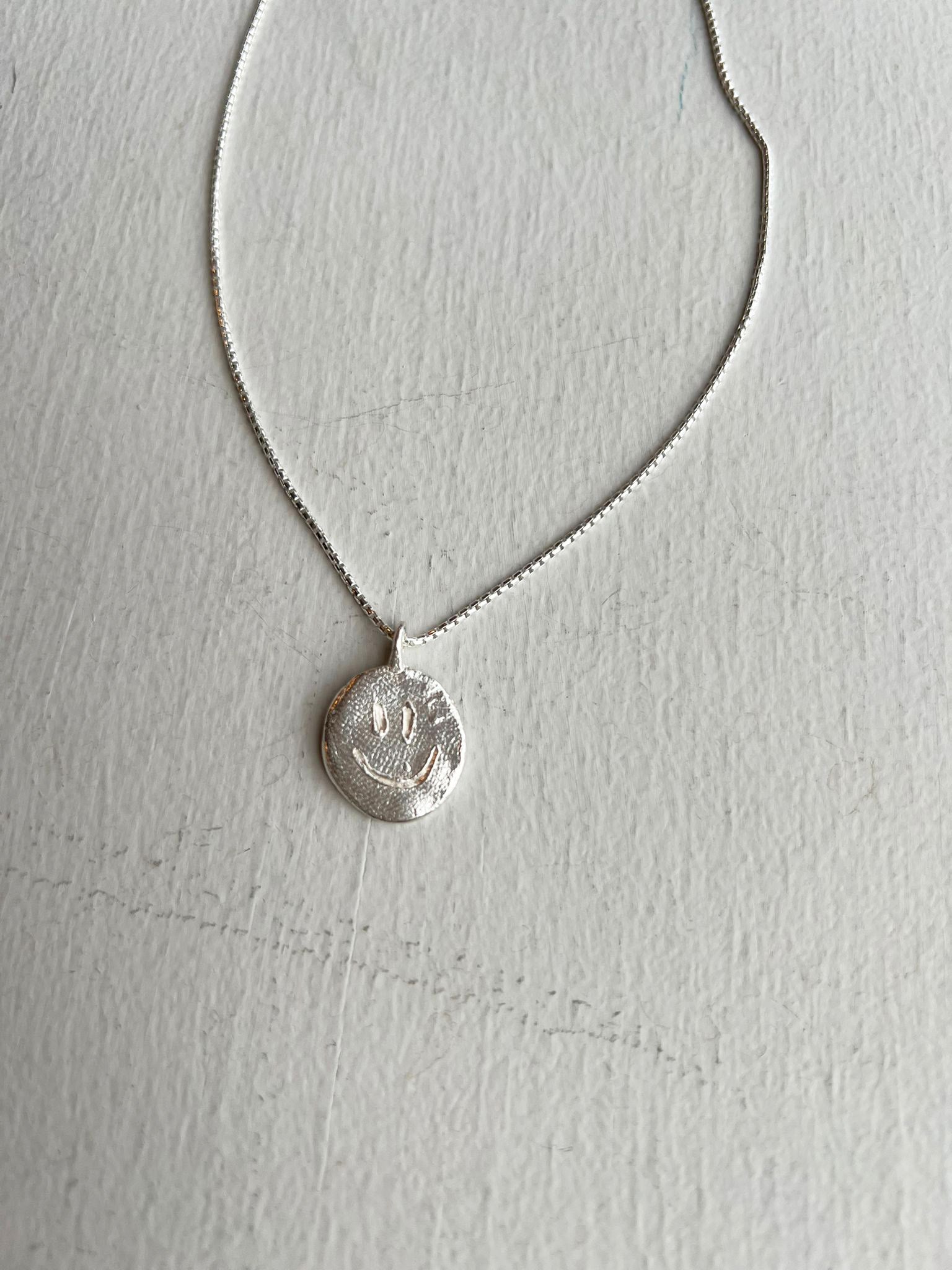 Erica Leal - Smile Pendant Necklace - Round closeup