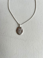 Erica Leal - Snoopy Cameo Necklace - full body snoopy - closeup