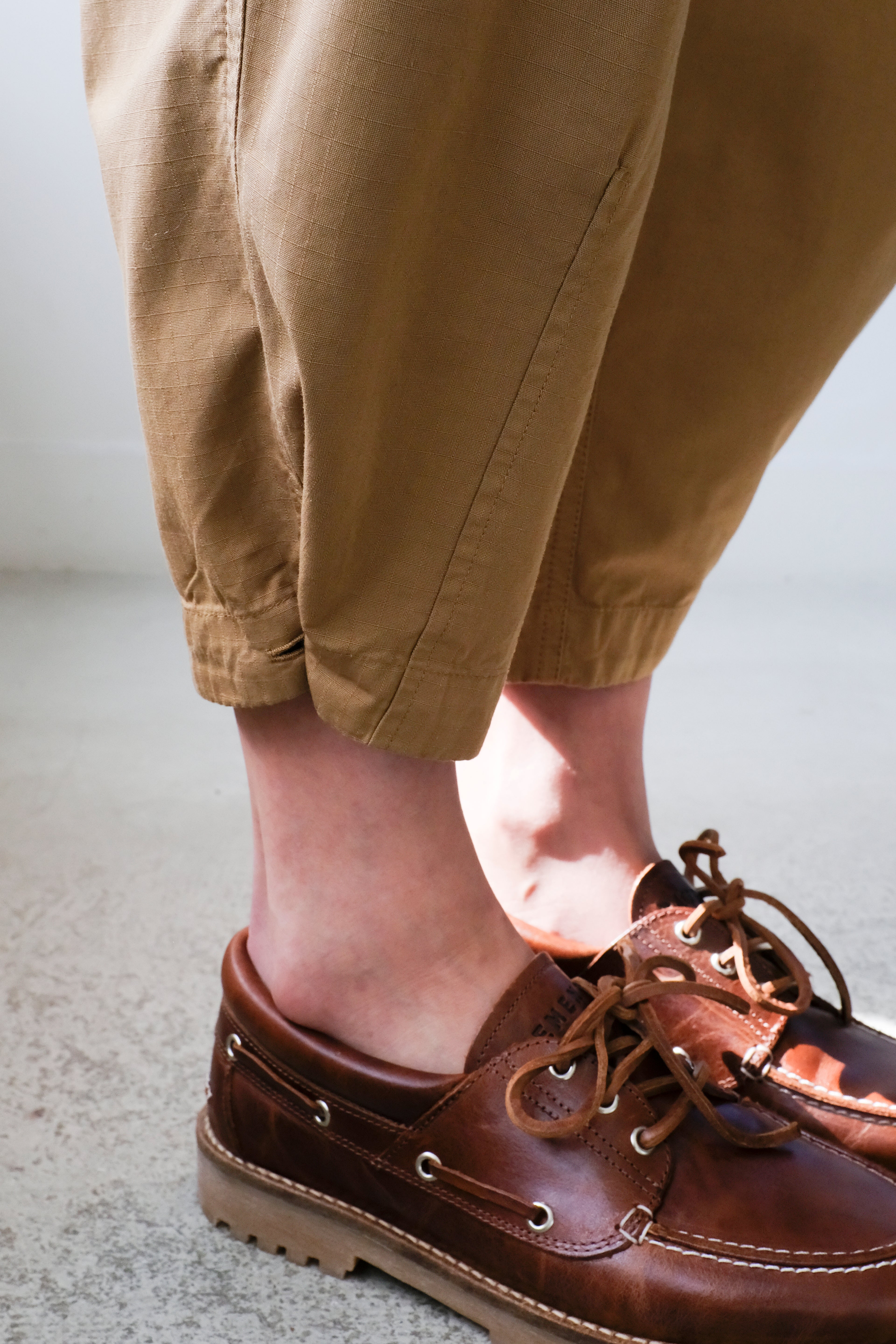 Homecore - Kelani Ripstop Pants - Desert Beige - hem detail, buttoned up