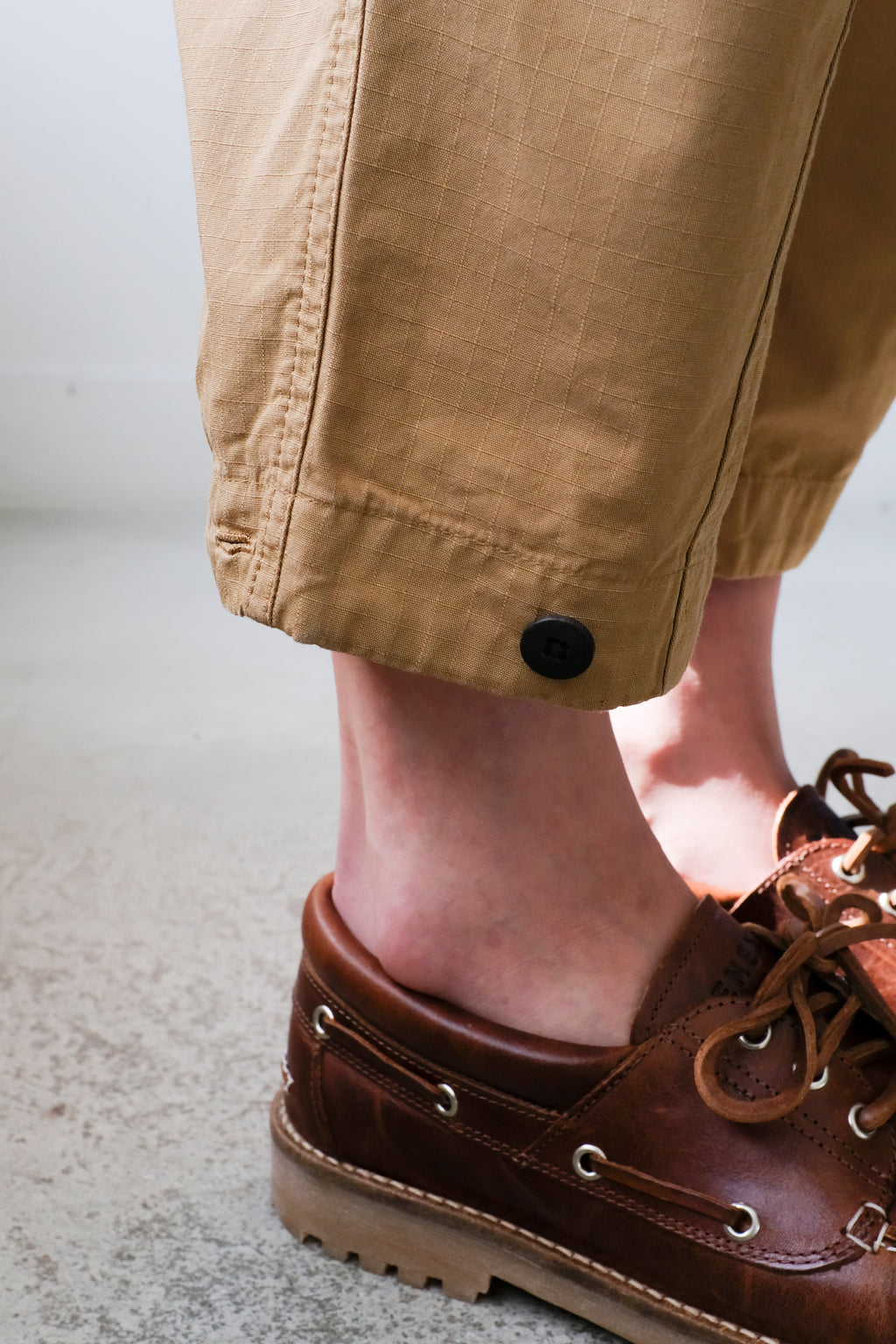 Homecore - Kelani Ripstop Pants - Desert Beige - hem detail, unbuttoned