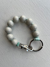 Load image into Gallery viewer, ina seifart - BIG Perlen Short Keyholder - grey beads teal ribbon

