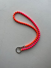 Load image into Gallery viewer, ina seifart - Perlen Long Keyholder - neon orange and pink beads, salmon ribbon
