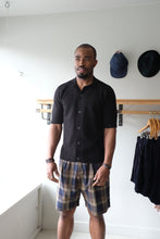Load image into Gallery viewer, Universal works - Pleated Track Short - Check Navy/Brown - front
