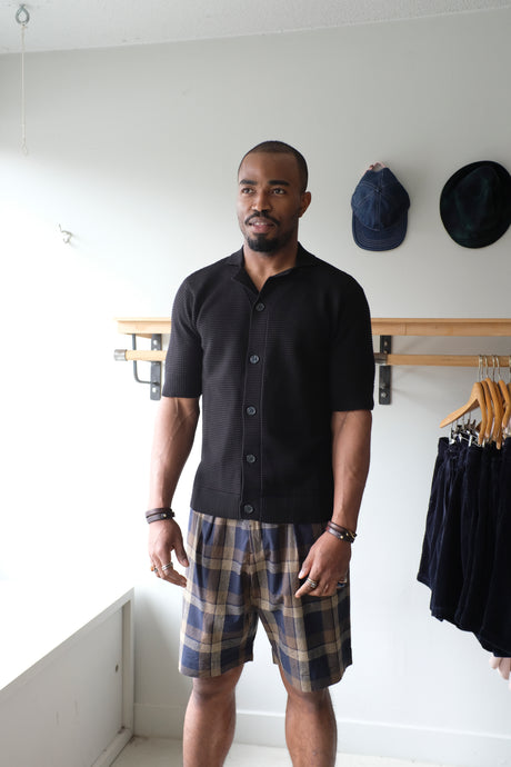 Universal works - Pleated Track Short - Check Navy/Brown - front