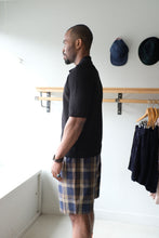 Load image into Gallery viewer, Universal works - Pleated Track Short - Check Navy/Brown - side
