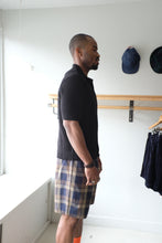 Load image into Gallery viewer, Universal works - Pleated Track Short - Check Navy/Brown - side
