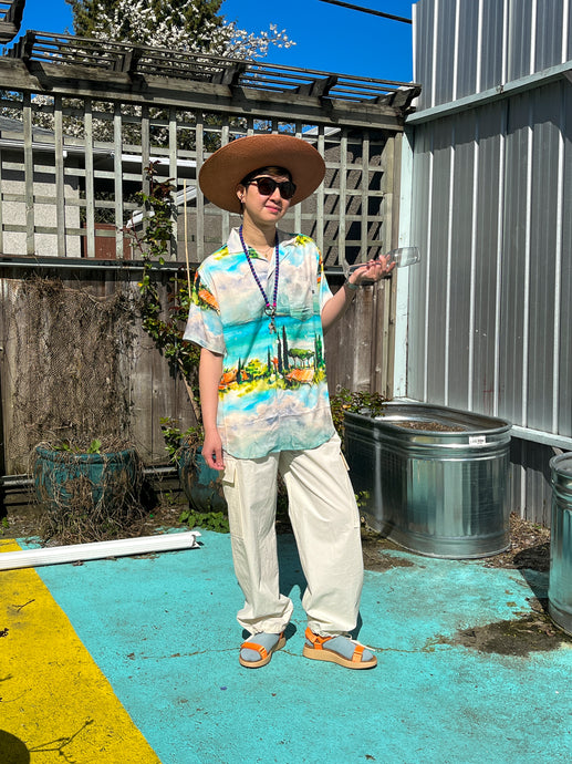 Wemoto - Vernon Camp Shirt - Sea Print - front. The print on this shirt is a painted landscape of a seaside view. 
