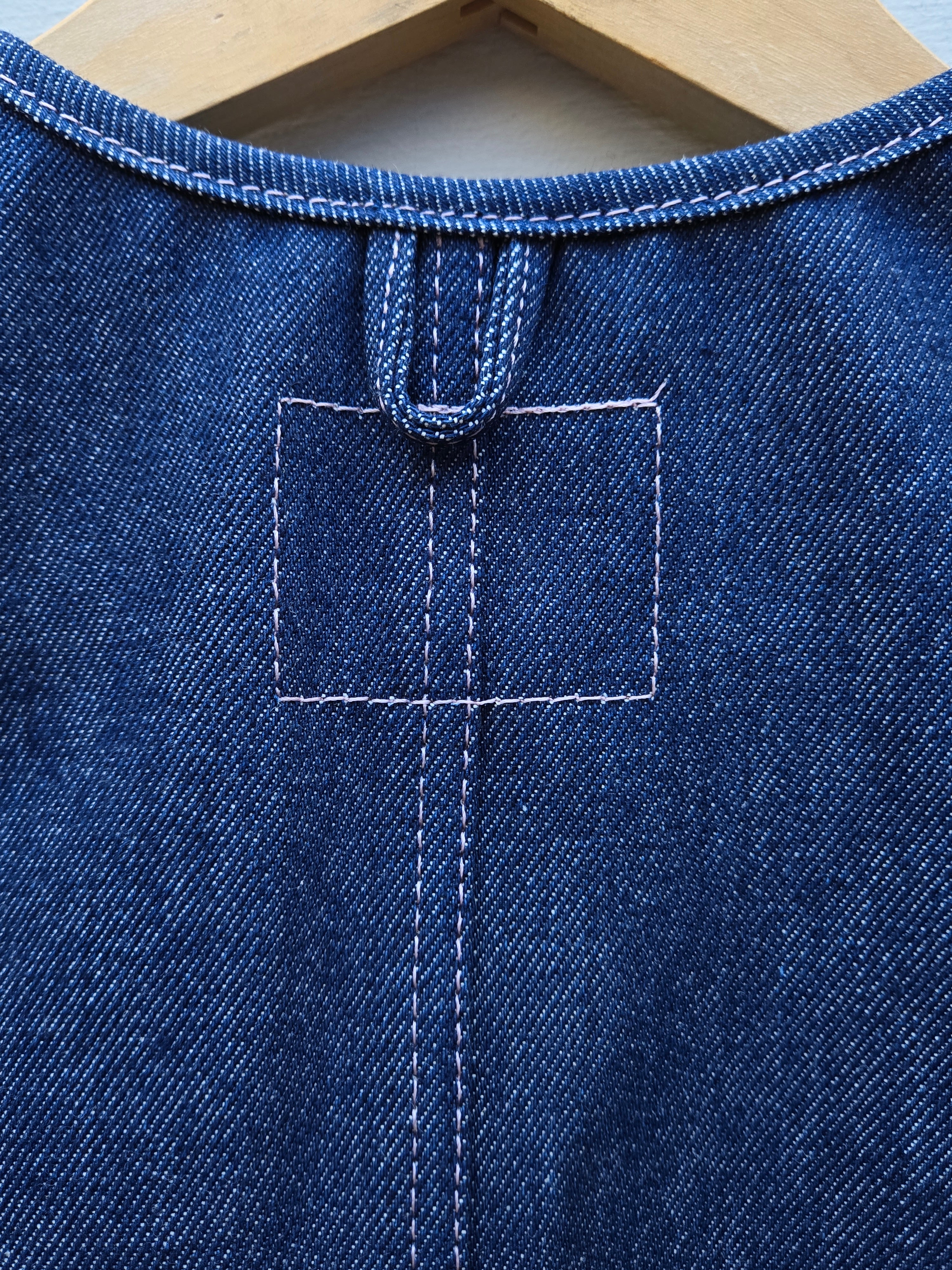 Old Fashioned Standards - Y Vest - Dark Denim - back fabric hook and pink stitch rectangle