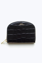 A.P.C Demi-Lune Coin wallet in Black Crocodile: this wallet is cow leather embossed to look like gator skin, it is in a true onyx black colour and finished in a slightly glossy texture