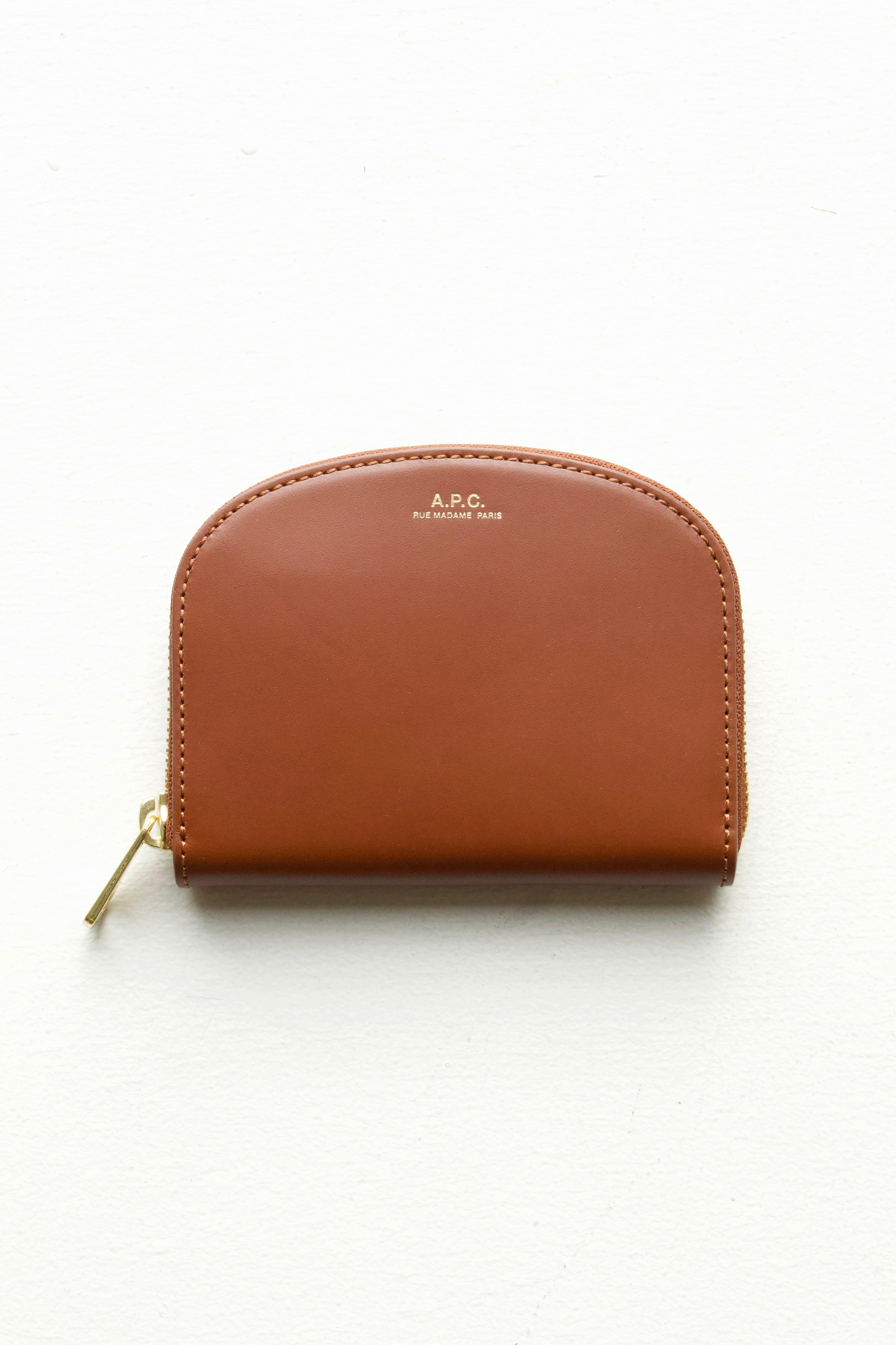 A.P.C Demi-Lune Coin wallet in Hazelnut: this wallet is a warm dark brown in a smooth matte finish
