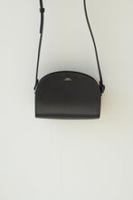 Load image into Gallery viewer, The Demi-Lune mini bag in black, this purse is a true onyx black
