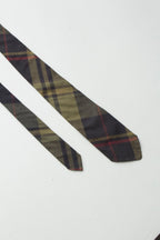 A lightweight, thin cut cotton tie in an all-over green plaid