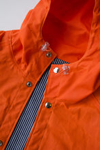 Load image into Gallery viewer, Old Fashioned Standard - 100% Chance Rain Jacket in Orange - front collar button detail
