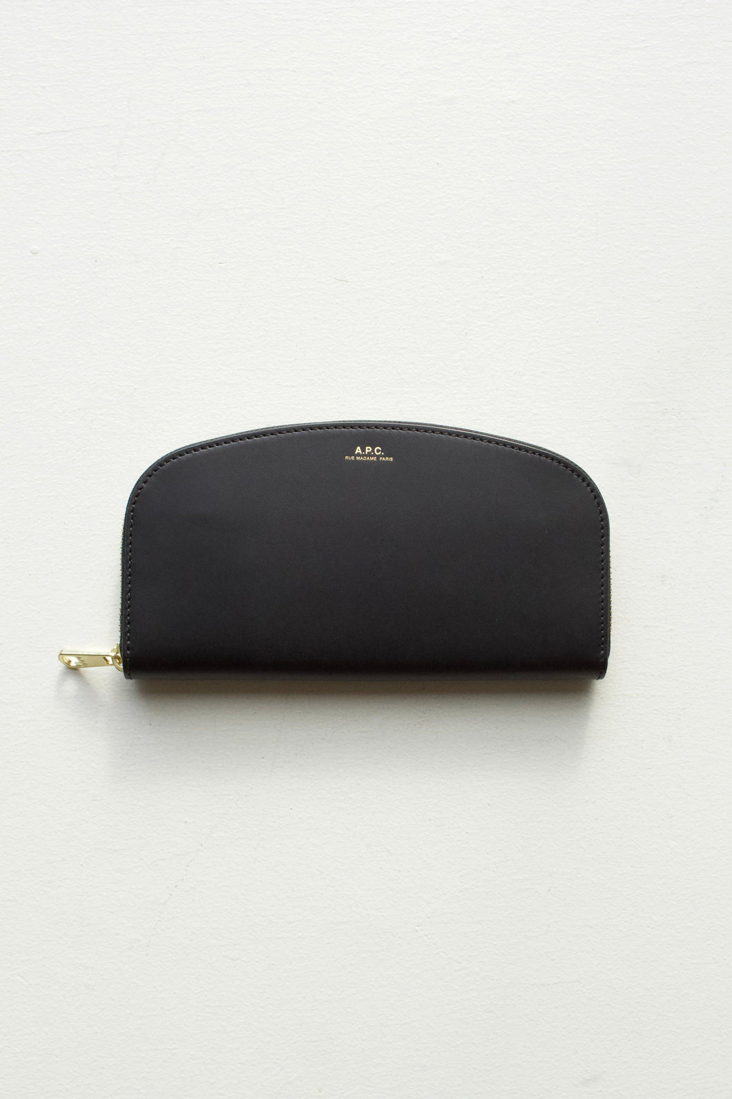true onyx black continental-style wallet. The A.P.C Demi Lune Wallet