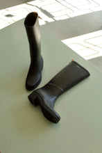 Load image into Gallery viewer, The Miss Juliette A is an all back natural rubber rain boot that comes up to just below the knee
