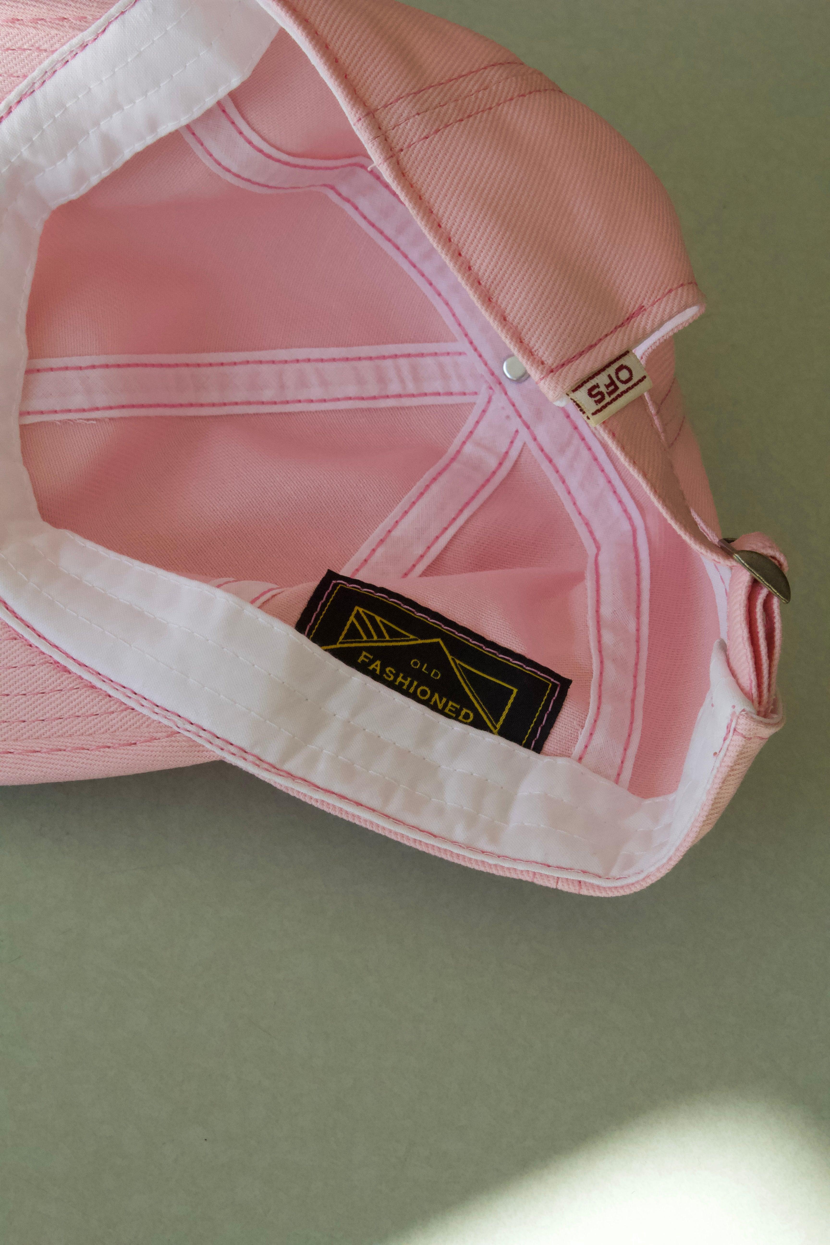 An inside shot of the 6 panel baseball cap from Old Fashioned Standards. This Classic silhouetted baseball hat features an inner sweatband and namesake logo sewn in patch