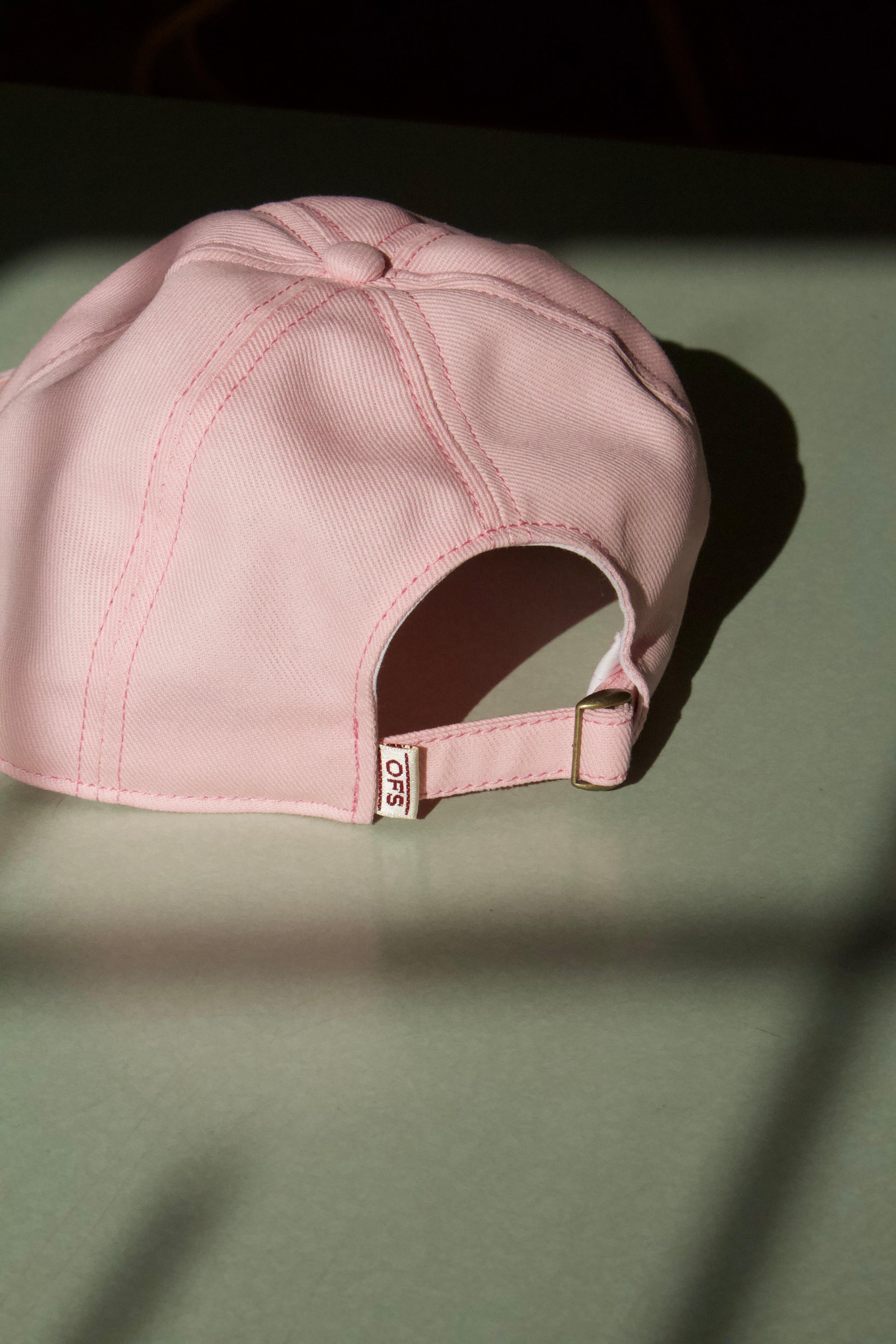 A rear shot of the 6 Panel baseball cap from Old Fashioned Standards. The rear features an adjustable slider with real metal hardware. It also features a small namesake logo tag. 