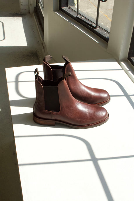 York Chelsea Boot by Shoe the Bear - it features all the classic characteristics of a mens chelsea boot: rich warm brown leather, stacked wooden sole with rubber bottom. rounded toe, boot straps and elastic side panels. 