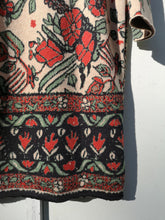 Load image into Gallery viewer, Anntian Jacquard Knit Carpet Dress - front closeup of hem and carpet fabric detail
