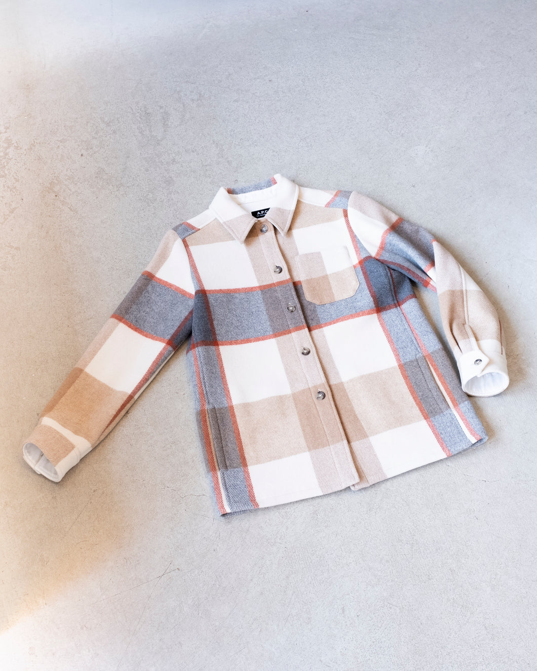 APC Darlene Shortcoat - flat front. This shortcoat features a beige, grey, white and red plaid pattern.