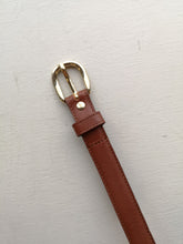 Load image into Gallery viewer, A.P.C. Rosette Belt - Hazelnut - gold belt buckle and leather detail
