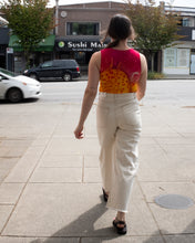 Load image into Gallery viewer, Jamie walking onto Main Street in B-sides lasso jean styled with Paloma Wool The Gate Tank and Jerusalem Sandals Golan - back
