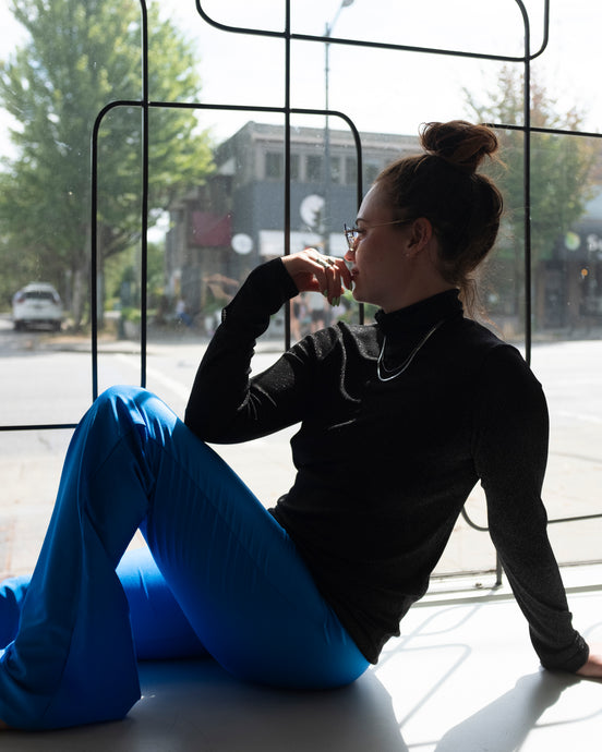 Filippa K Caroline Turtleneck has a shimmer. We paired it with the Shimmer Bootcut Legging for a subtle whole body sparkle!