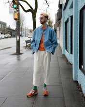 Load image into Gallery viewer, henrik vibskov d jacket worn with apc vpc sweater in orange, white pants, emerald green socks and orange new balance sneakers.
