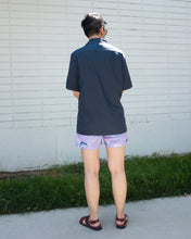 Load image into Gallery viewer, nikben nuit mightnight shirt and swimtrunks in acapulo dolphin pattern - back
