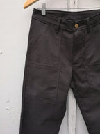 Old Fashioned Standards - Workhorse Trouser - Black - front closeup of pockets, waist, zip fly, button closure