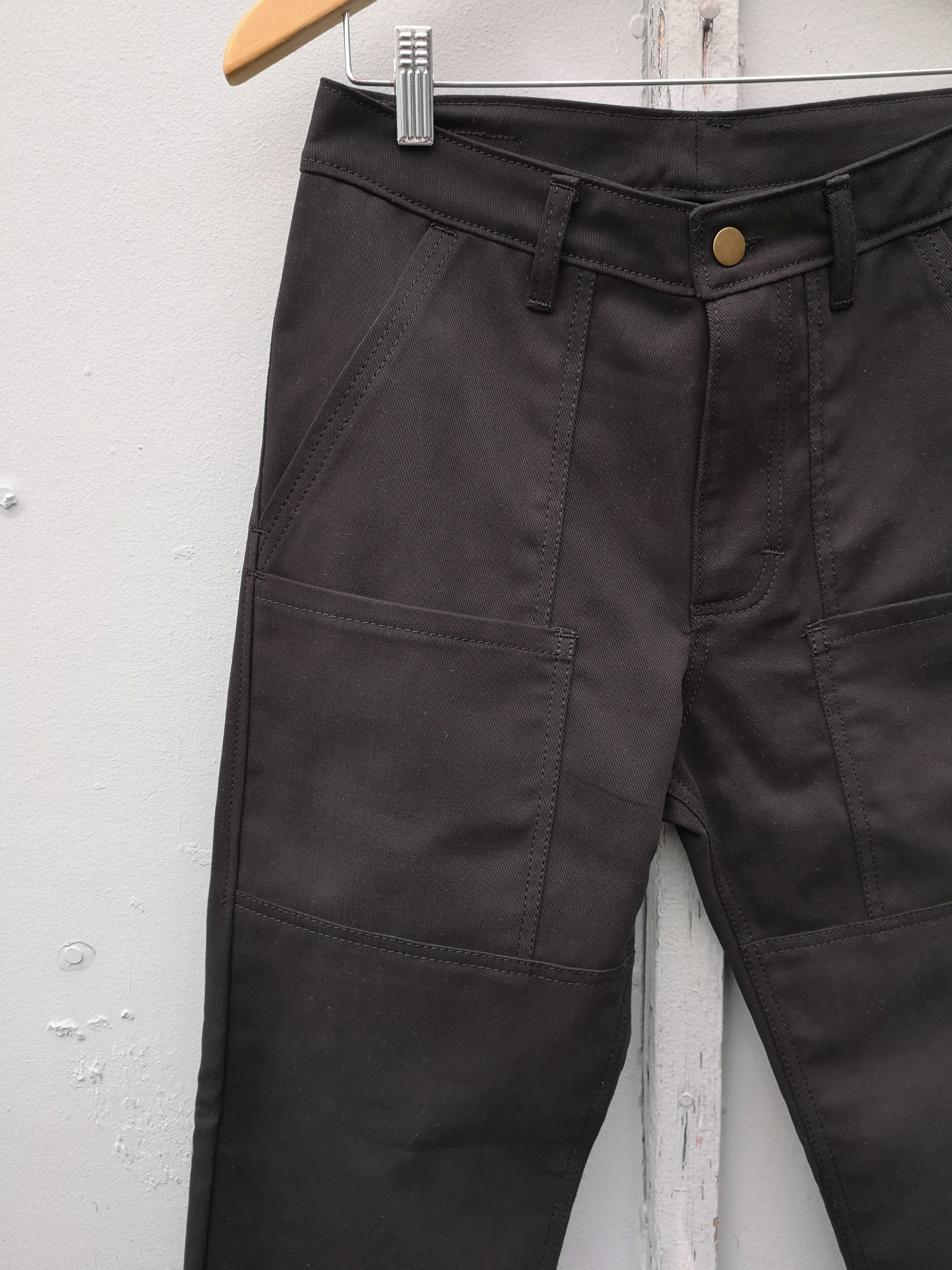 Old Fashioned Standards - Workhorse Trouser - Black - front closeup of pockets, waist, zip fly, button closure