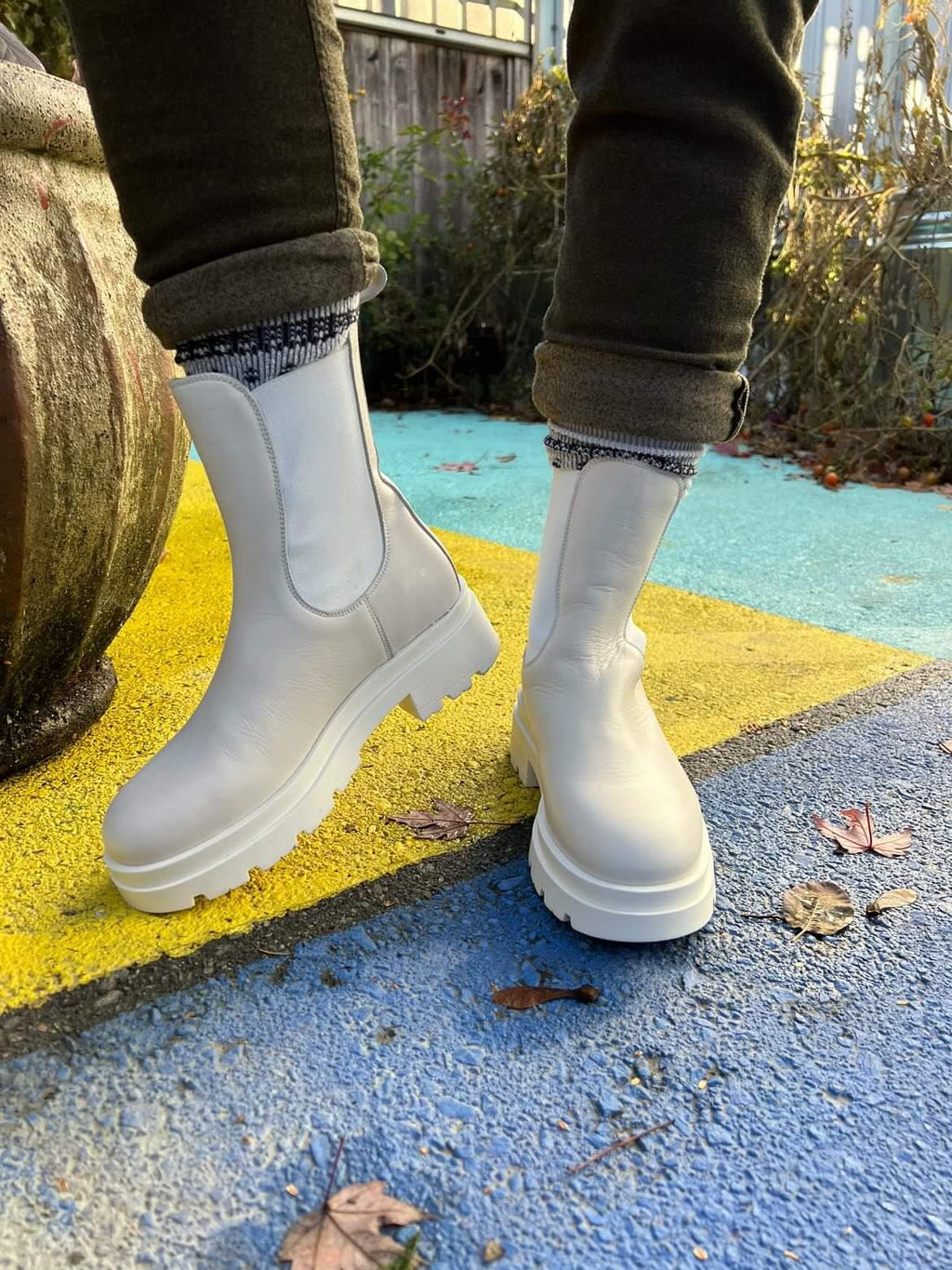 Sister x Soeur Gemma Chelsea Boot in Cream - front with one feet lifted