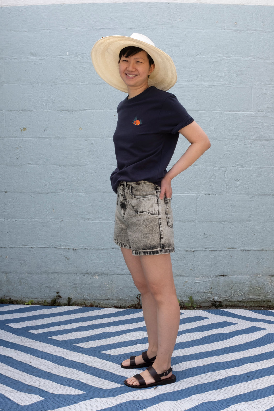 Wemoto Tent tee and Pastiche irvy denim shorts with Chamula brisa hat and Jerusalem Golan Slingback Sandal - front