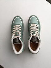 Load image into Gallery viewer, Woden Nellie Soft Sneaker - Algae - top view of sneaker, laces
